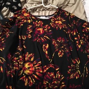 Brightly colored lularoe top.